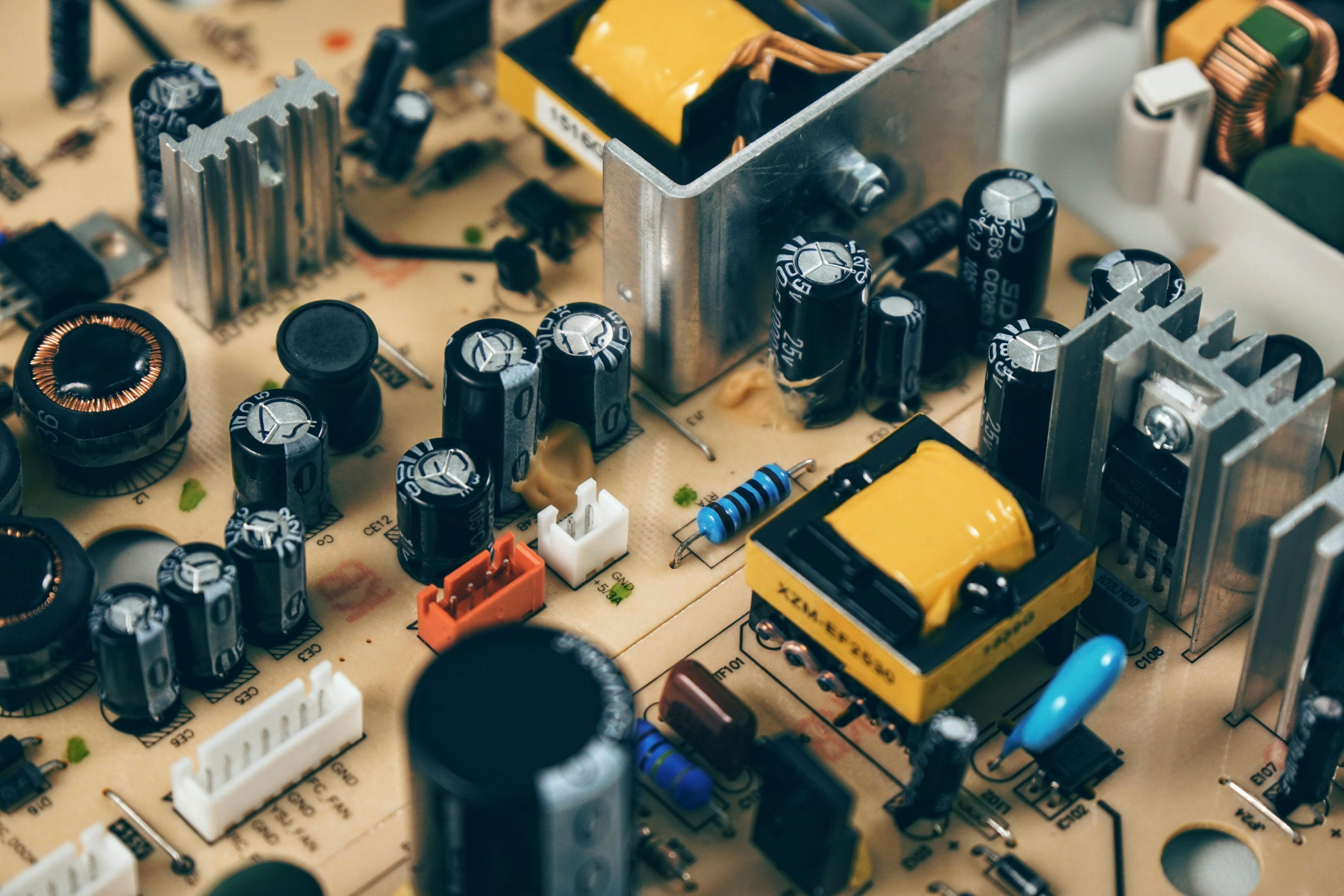 Technician performing circuit board diagnostics